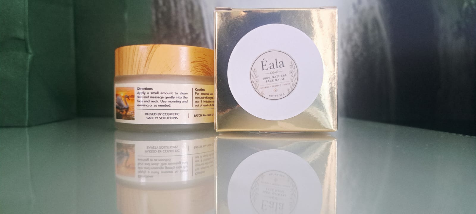 Close-up product photograph of Éala Natural Balm jars
